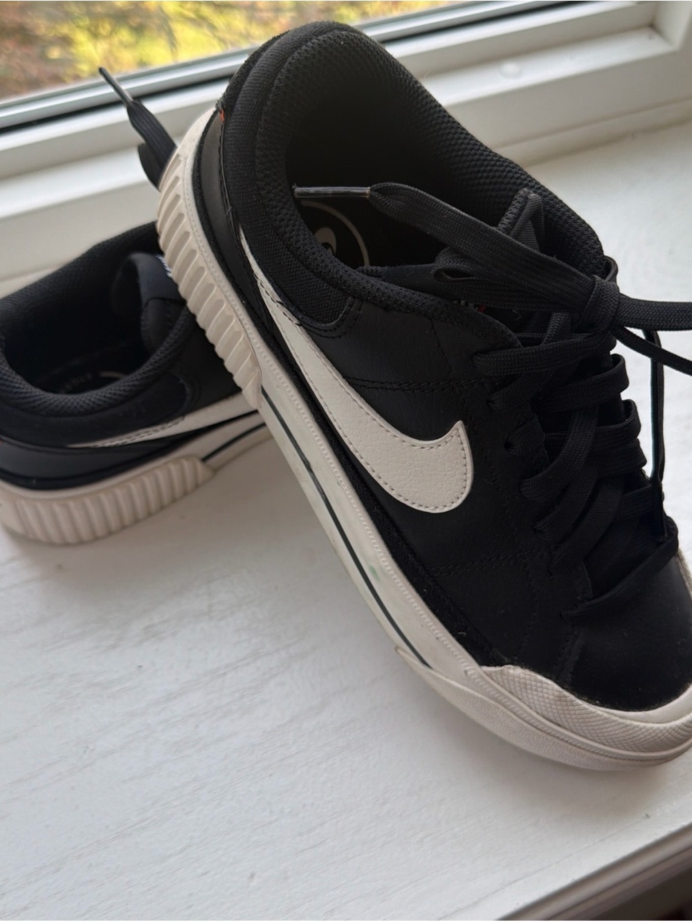 Nike Black Sneakers with White Swoosh